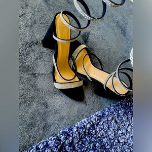 Wild diva, black with silver sparkles, and size 10